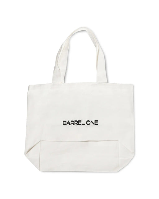 Barrel One's tote bag - stylish and practical for carrying beach or pool essentials. It is white in colour with a stylish design printed on it.